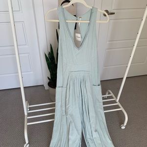 Blue free people jumpsuit, size small, never worn